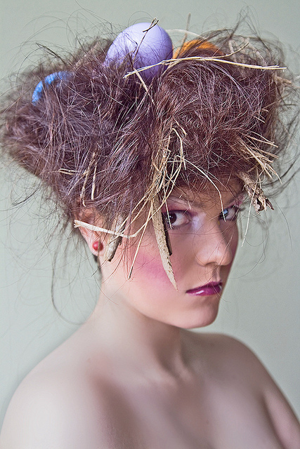 Woman with a birdnest in her hair
